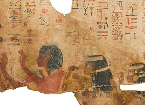 An Egyptian manuscript on papyrus paper featuring hieroglyphs and three illustrations of females