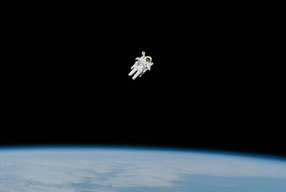 An astronaut floating in space.