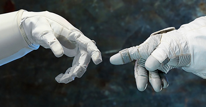 Two astronauts touching fingers