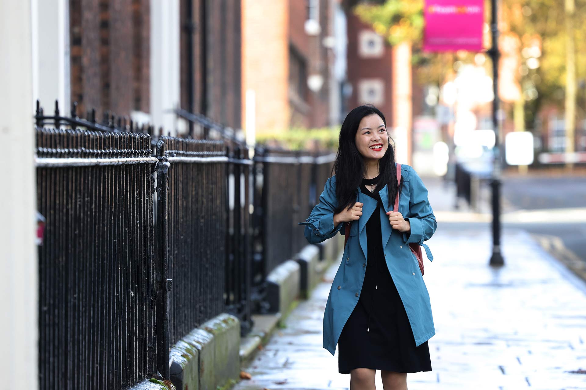 Xueping Yang walking through campus - Postgraduate Student