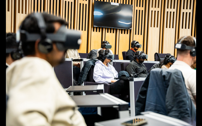 Students using VR as part of an MBA session
